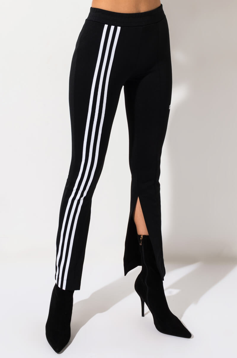adidas with black stripes on one side