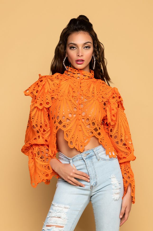 Front View A Lot Of Love Long Sleeve Eyelet Cropped Blouse in Orange