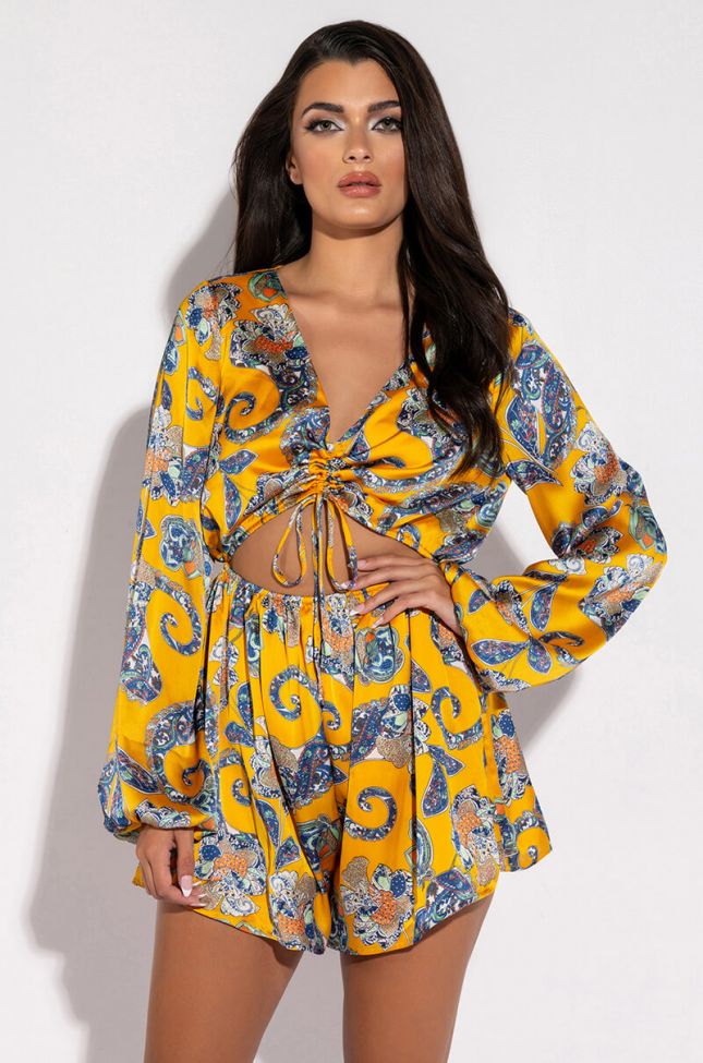 Front View Admit It Long Sleeve Printed Romper With Cut Out