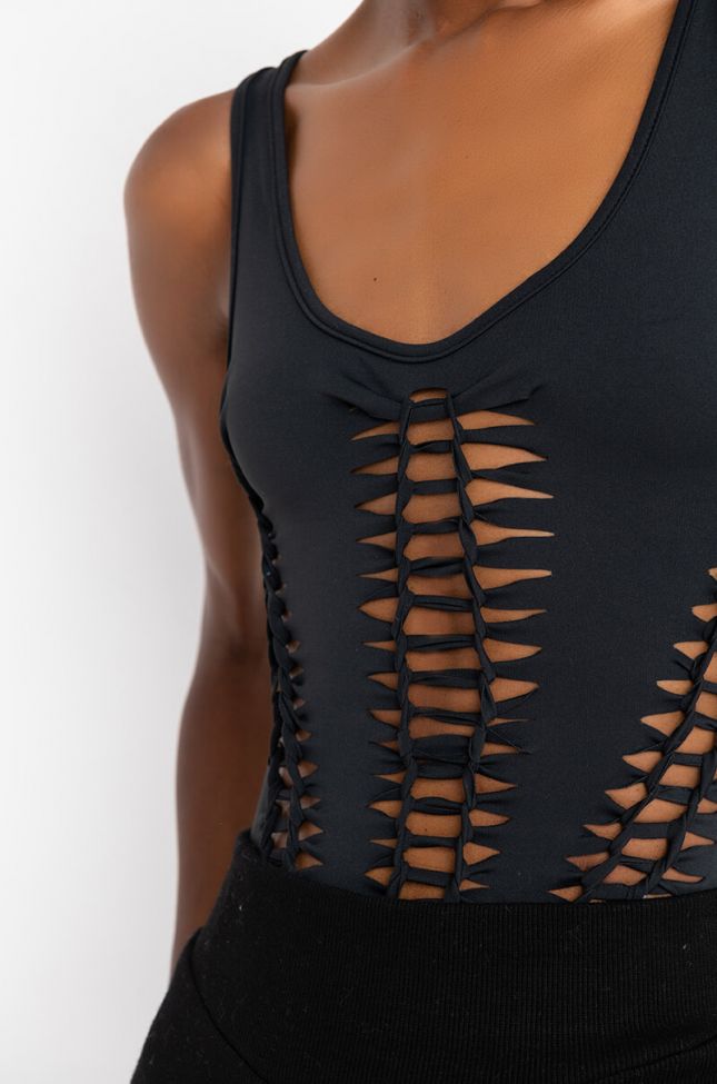 Detail View All The Cutouts Snatched Bodysuit in Black