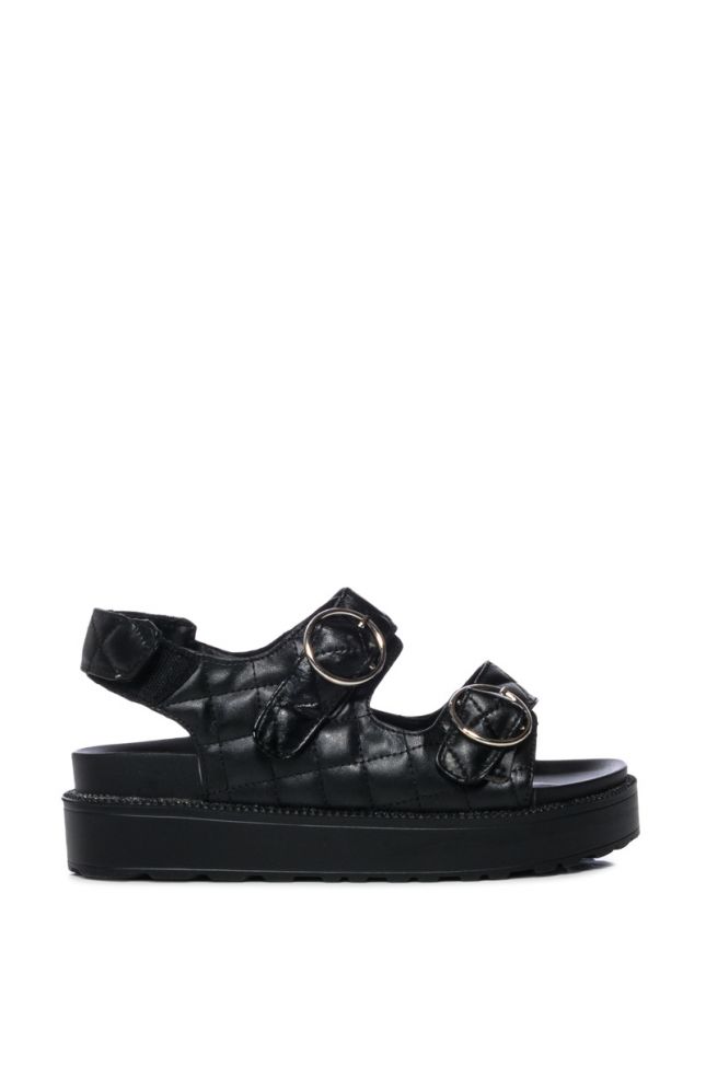 CHIC ERA QUILTED BUCKLE FLAT SANDAL IN BLACK