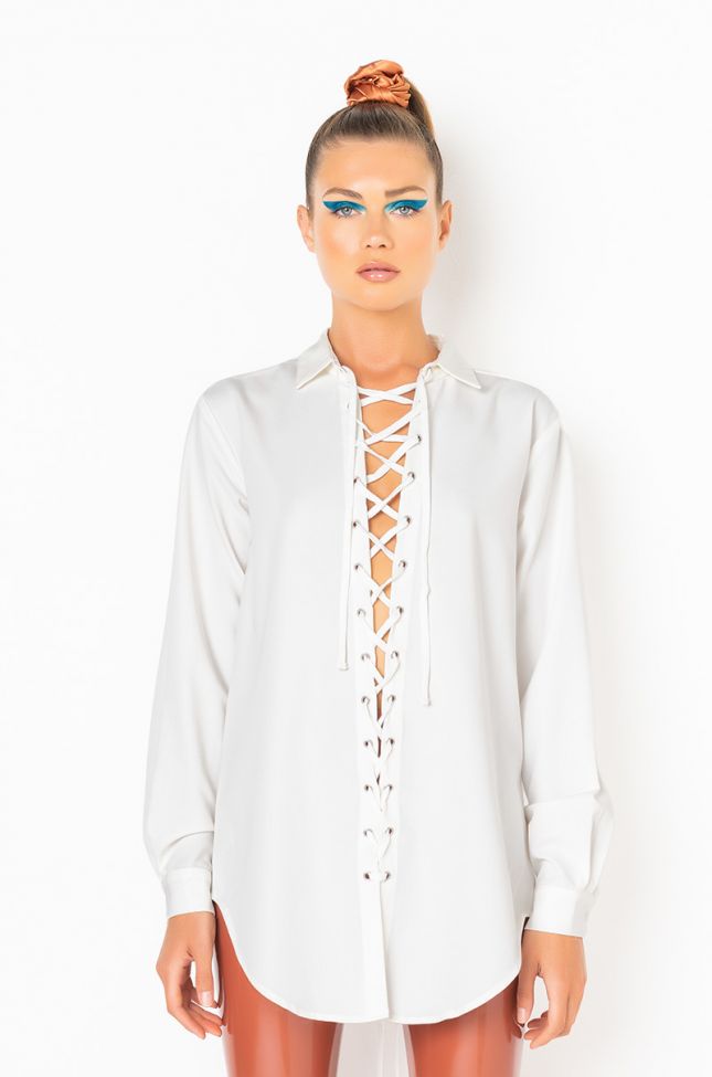 Front View Hold That Thought Oversized Front And Back Lace Up Blouse in White