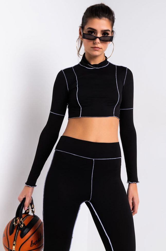 Front View Inside Out Mock Neck Long Sleeve Crop Top in Black White