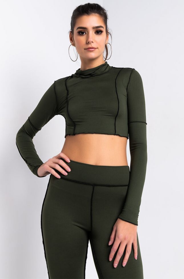 Front View Inside Out Mock Neck Long Sleeve Crop Top in Black White