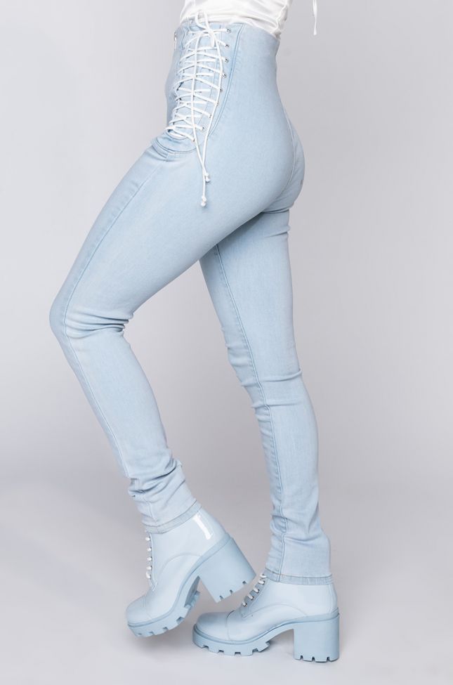 Side View Margot Lace Up Skinny Jeans in Light Blue Denim