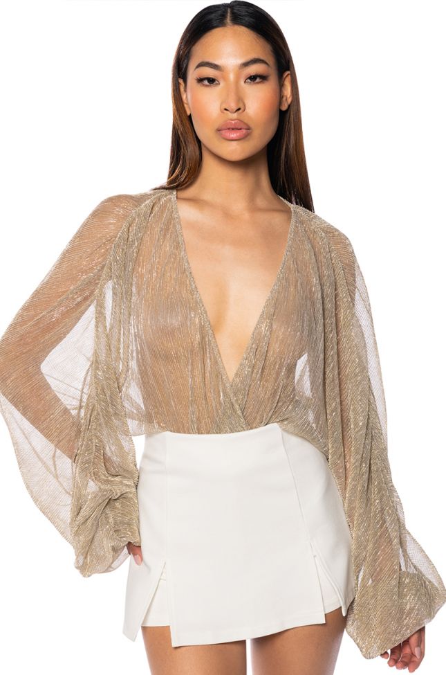 Front View Slow Motion Long Sleeve Wrap Front Bodysuit In Champagne