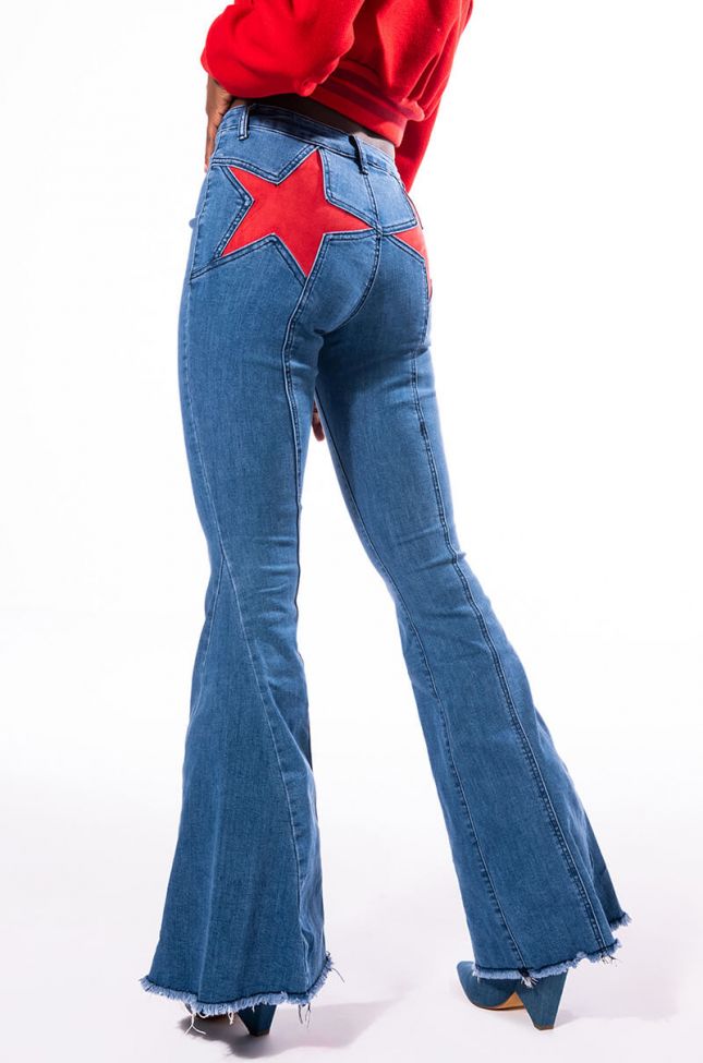 Front View Take Me Away Star Patch Detail High Waisted Flared Jean