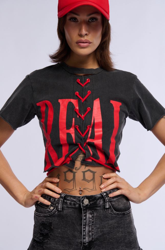 Front View The Real Deal Lace Up Graphic Tee