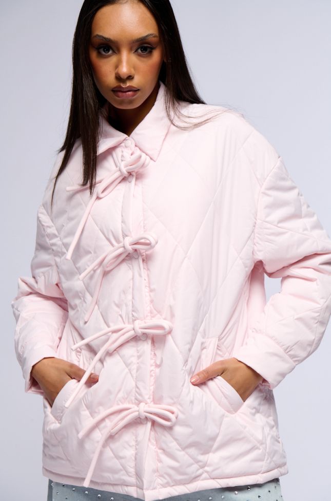 Front View Tribecca Pale Pink Quilted Bomber With Bows