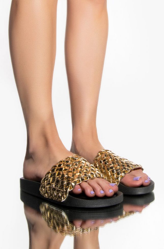 Front View Twisted Love Flat Sandal In Gold